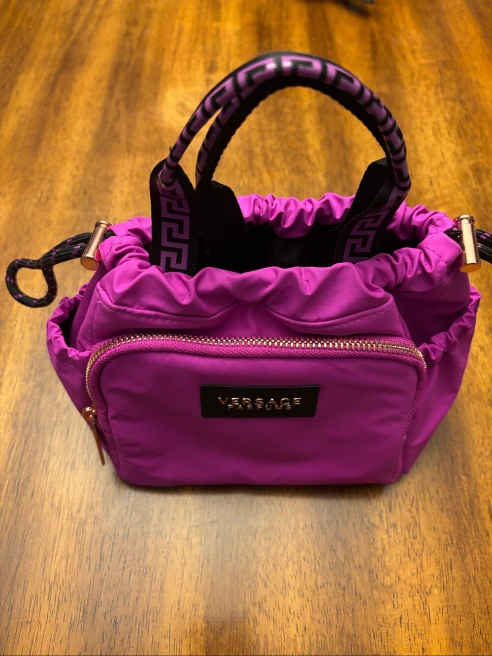 Mini Versace perfumes top handle bag